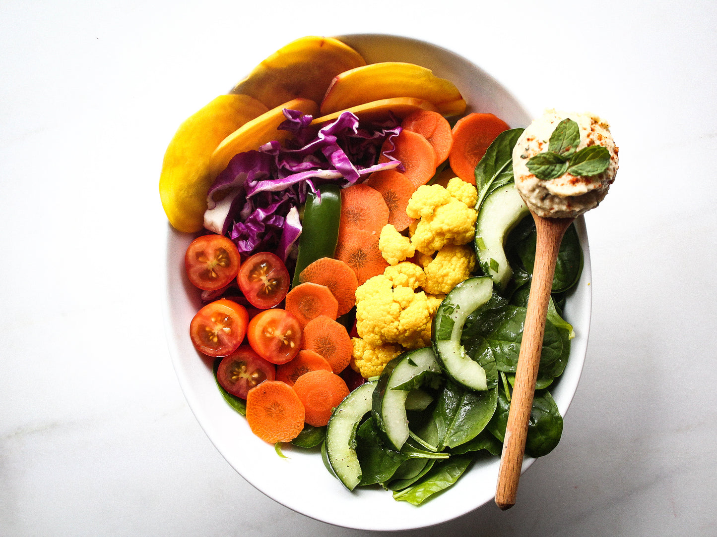 Hummus Chick's roasted garlic and cilantro hummus is the perfect addition to your fridge!