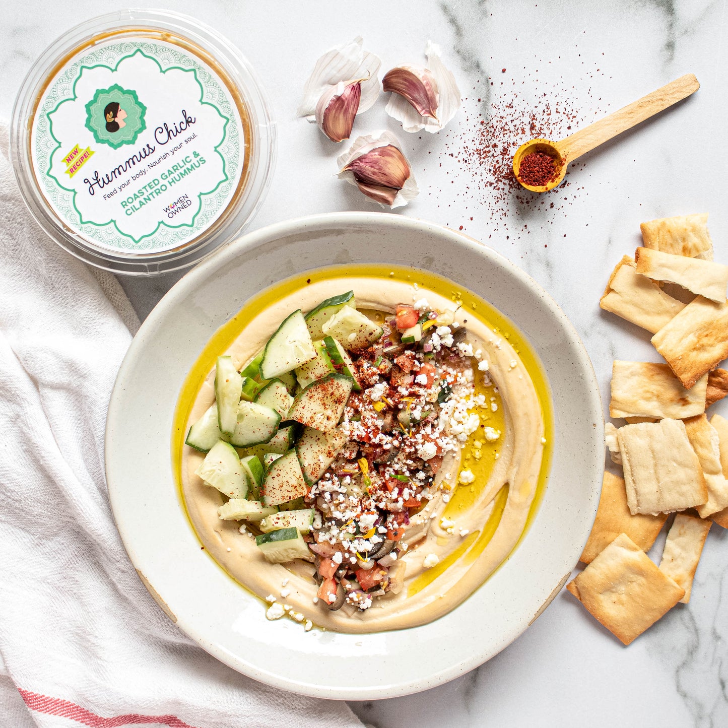 Hummus Chick's roasted garlic and cilantro hummus is the perfect addition to your fridge!